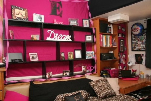 Hot pink and leopard print themed dorm room.