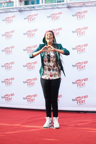 Lilly Singh of IISuperwomanII on the YouTube FanFest red carpet